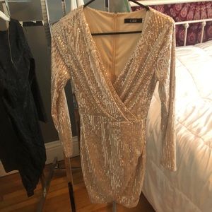 2 dresses one sweater and a jogger romper